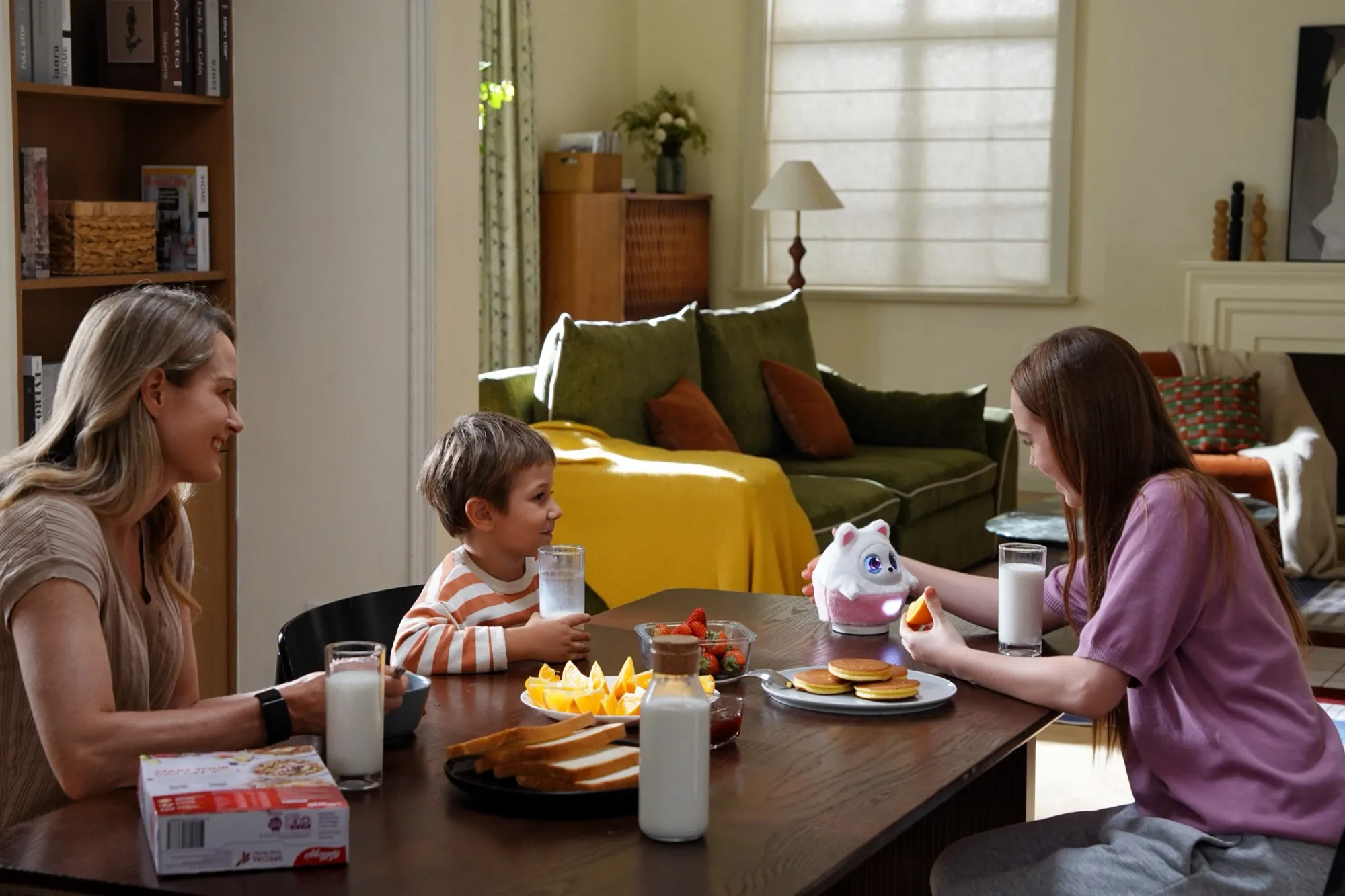 Una famiglia fa colazione insieme a Pophie