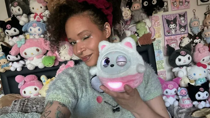Rhian with Pophie and her plush collection