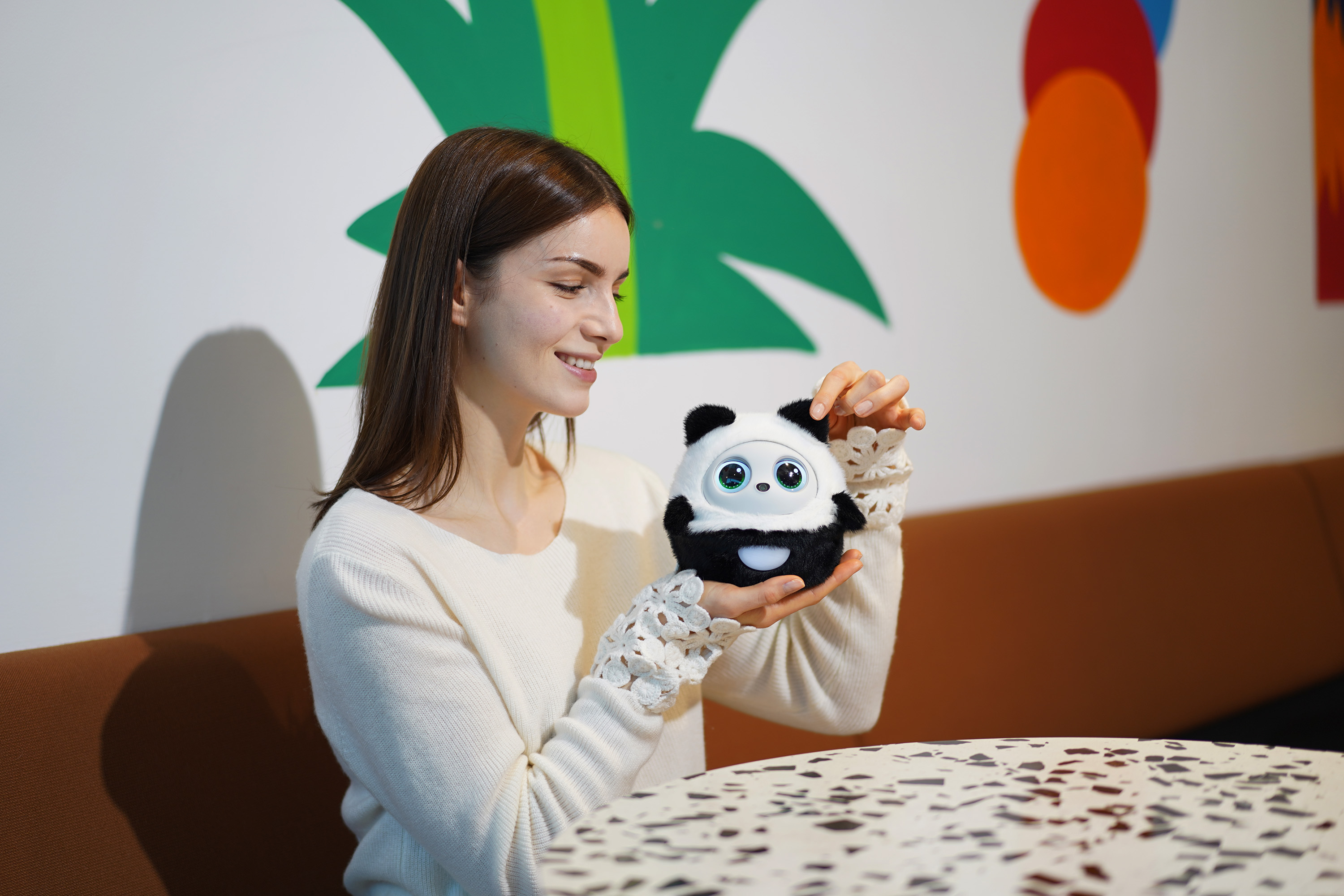 Woman holding Pophie panda variant